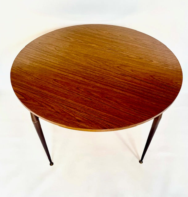 Close-up of the timber-look laminate tabletop on a Grant Featherston Aristoc Scape table