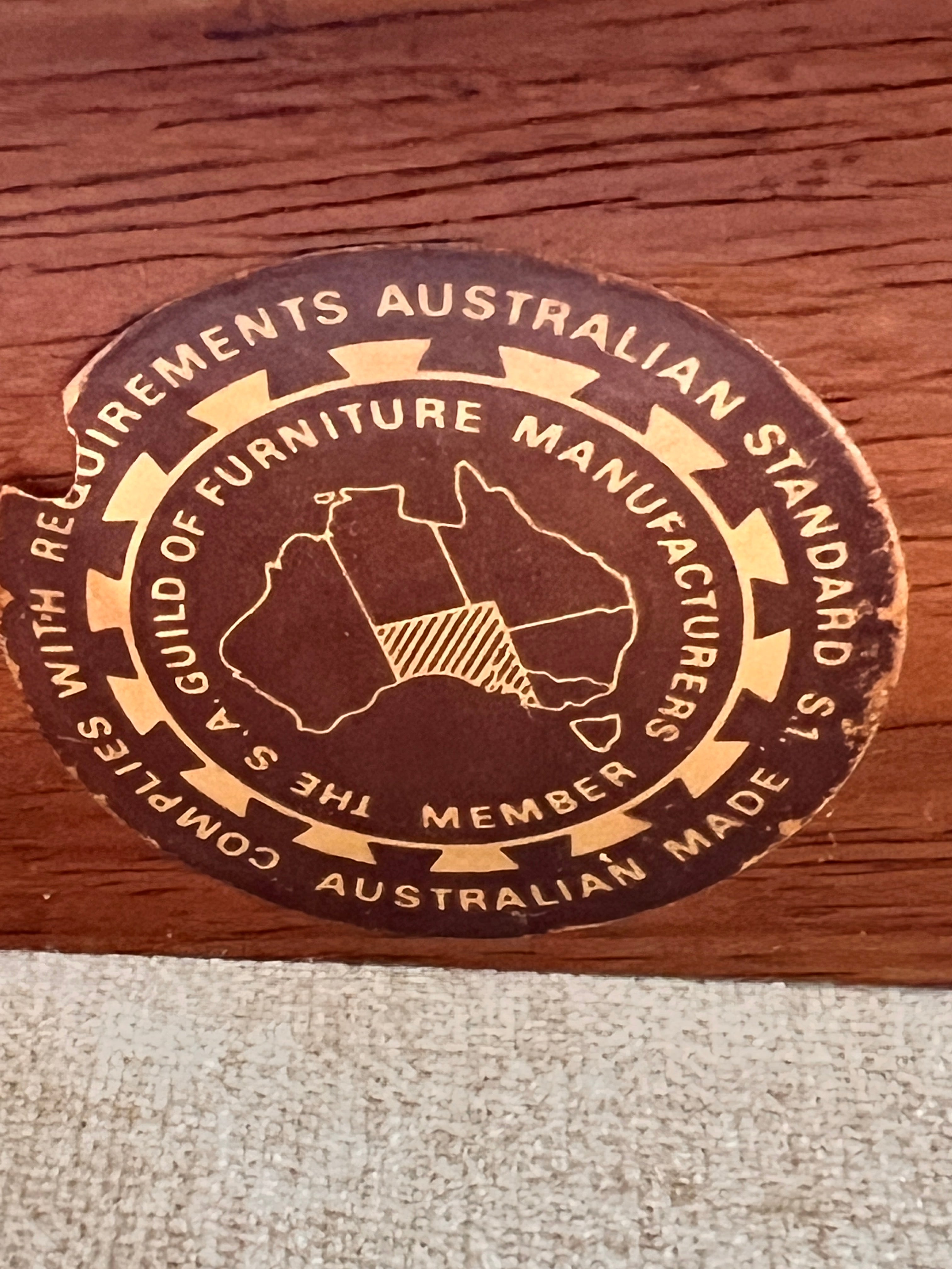 TH Brown Carver chair with square teak frame, quality badge