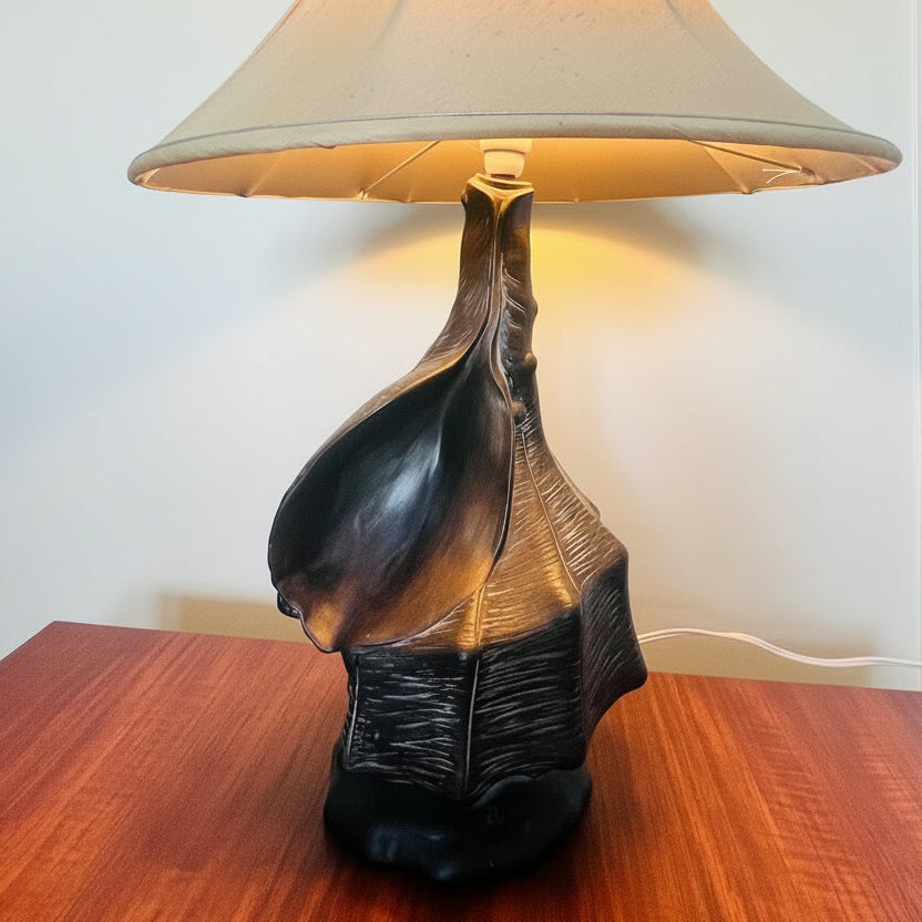 Decorative table lamp with a unique base